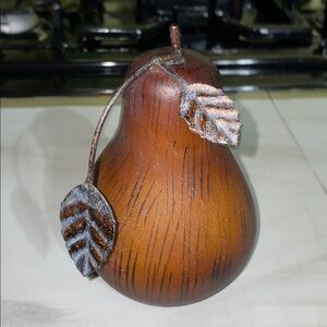Wooden pear with metal leaves and stem